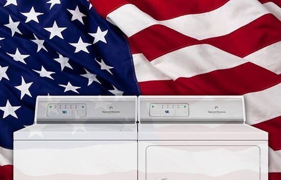 Speed Queen washer and dryer in front of an American flag